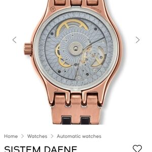 Swatch Rose Gold Tone Automatic Skeleton Watch with Silver Dial